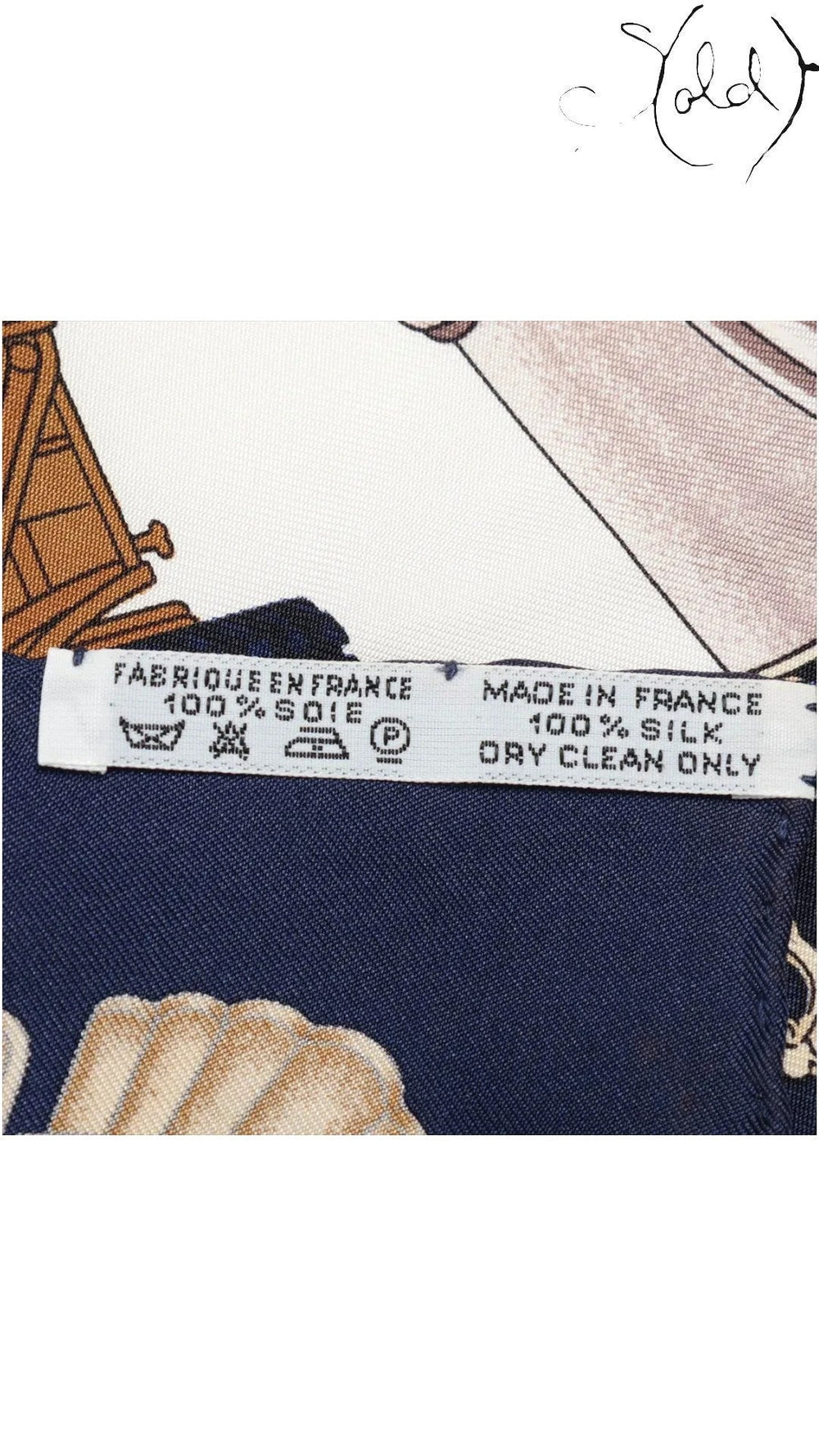 Sold Attire Hermes Automobiles silk scarf care label showing 100 percent silk and Made in France origin