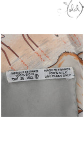 Sold Attire Hermes silk scarf care label showing Made in France and 100% silk composition details.
