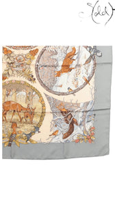 Sold Attire Hermes Les Quatre Saisons silk scarf featuring detailed seasonal animal illustrations on a grey background.