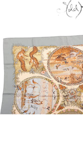 Sold Attire vintage Hermes Carre 90 Les Quatre Saisons silk scarf featuring detailed seasonal animal illustrations.
