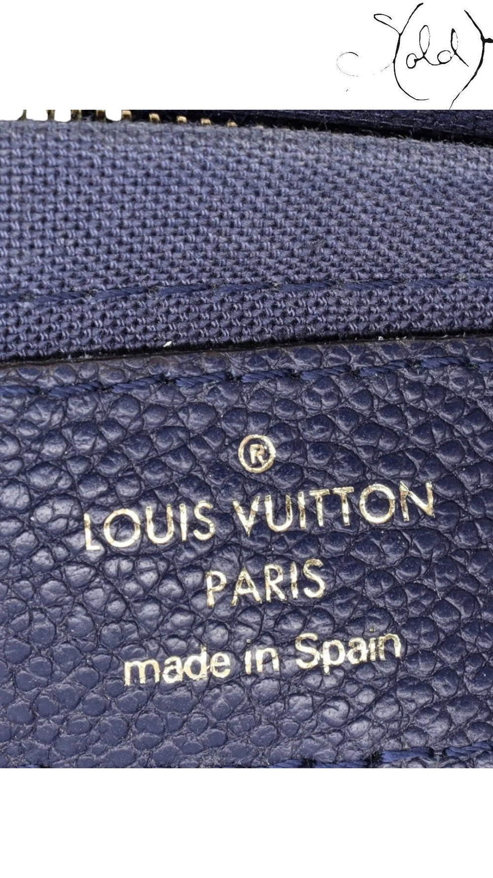 Sold Attire Louis Vuitton Pallas Clutch interior heat stamp on blue marine leather with Made in Spain engraving