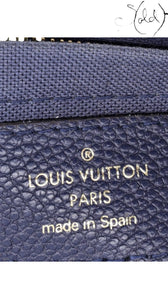 Sold Attire Louis Vuitton Pallas Clutch interior heat stamp on blue marine leather with Made in Spain engraving