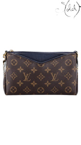 Sold Attire Louis Vuitton Pallas Clutch in brown Monogram coated canvas with Blue Marine leather trim and gold chain.