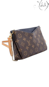 Sold Attire Louis Vuitton Pallas Clutch in brown Monogram canvas with Blue Marine leather trim and gold chain strap.