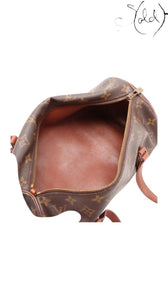 Sold Attire pre-owned Louis Vuitton Papillon 30 barrel bag interior with brown monogram canvas and textile lining