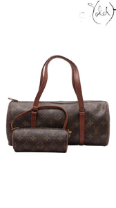 Sold Attire vintage Louis Vuitton Papillon 30 barrel bag in brown Monogram coated canvas with vachetta leather handles.