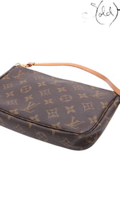 Sold Attire pre-owned Louis Vuitton Monogram Pochette Accessoires M51980 in brown coated canvas with leather strap.