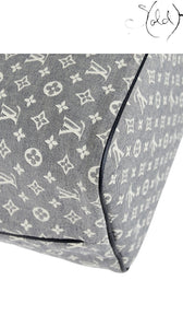 Sold Attire Louis Vuitton Neverfull MM tote in Encre Monogram Idylle canvas with dark calfskin leather corner trim.