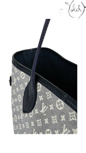 Sold Attire Louis Vuitton Neverfull MM tote in Encre Monogram Idylle canvas with dark blue calfskin leather trim.