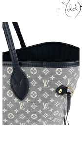 Sold Attire Louis Vuitton Neverfull MM tote in Encre Monogram Idylle canvas with navy calfskin trim and gold hardware.