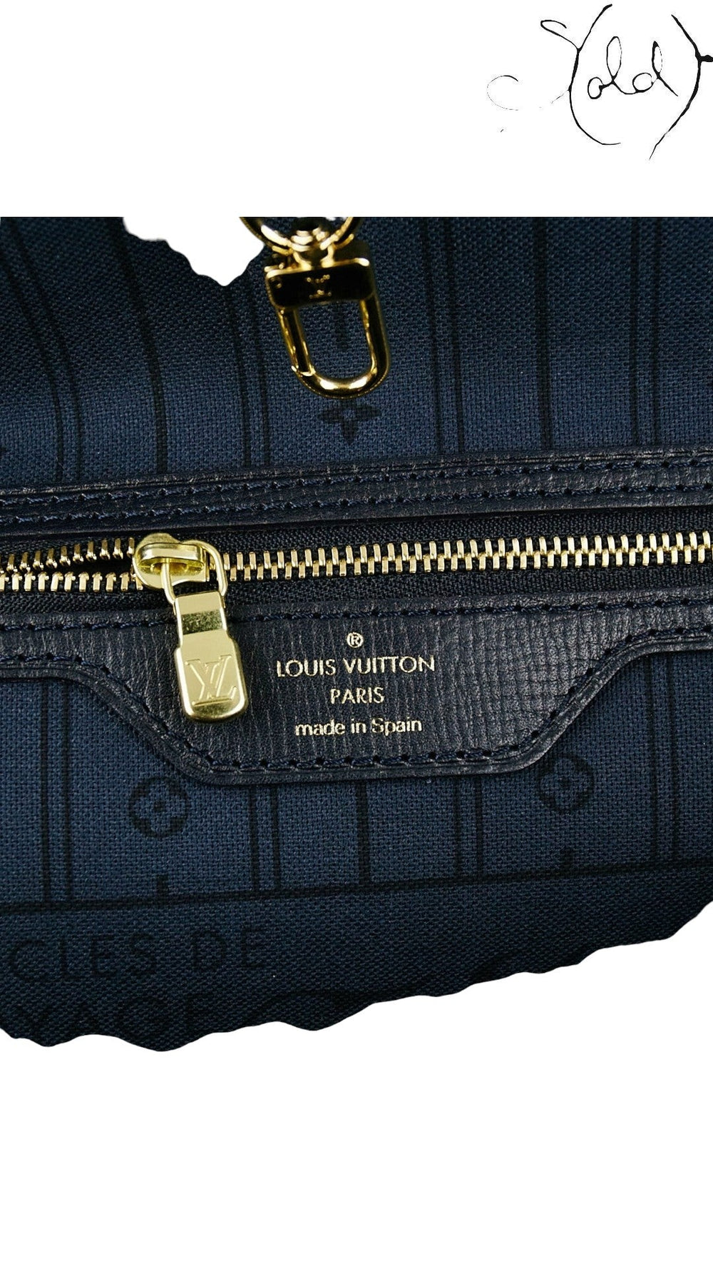 Sold Attire Louis Vuitton Neverfull MM interior featuring navy Monogram Idylle canvas, gold-tone zip, and leather tag.