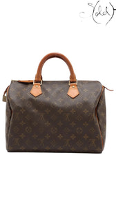 Sold Attire Louis Vuitton Speedy 30 Monogram canvas handbag with Vachetta leather trim and handles, circa 2000.