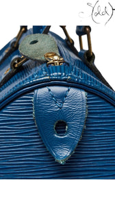 Sold Attire vintage Louis Vuitton Speedy 30 bag in Toledo blue Epi leather with gold-tone hardware and handle detail.
