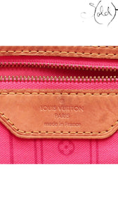 Sold Attire Louis Vuitton Stephen Sprouse Roses Neverfull MM interior with pink lining and leather logo patch.
