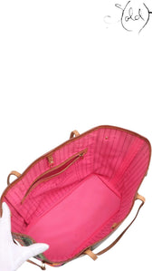 Sold Attire Louis Vuitton Stephen Sprouse Roses Neverfull MM tote bag with pink lining and leather trim.