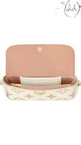 Sold Attire Louis Vuitton Wallet on Chain Ivy bicolor rose monogram empreinte calfskin with gold-tone hardware and pink lining.