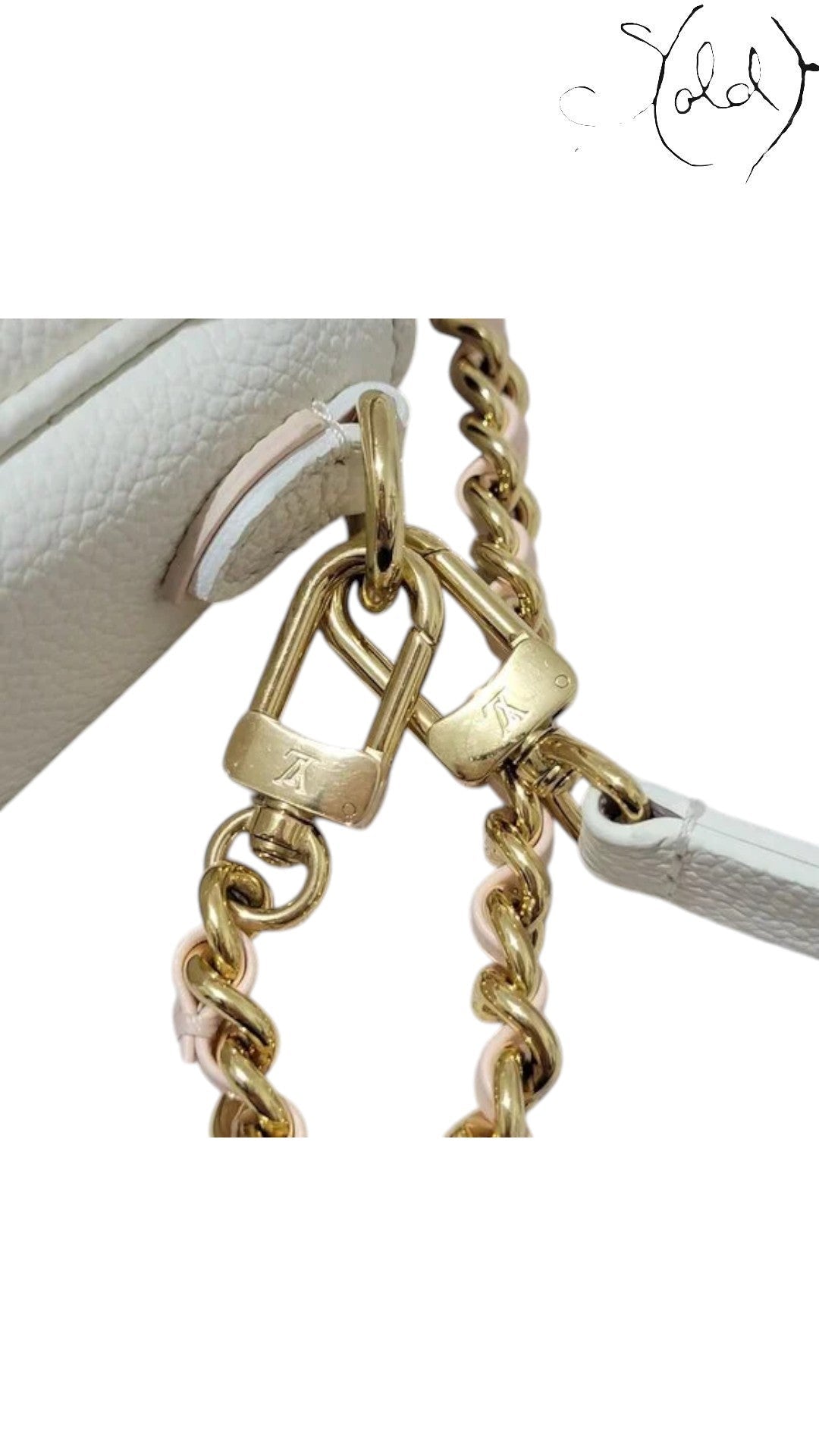 Sold Attire Louis Vuitton Wallet on Chain Ivy bicolor rose monogram empreinte calfskin with gold hardware and chain strap.