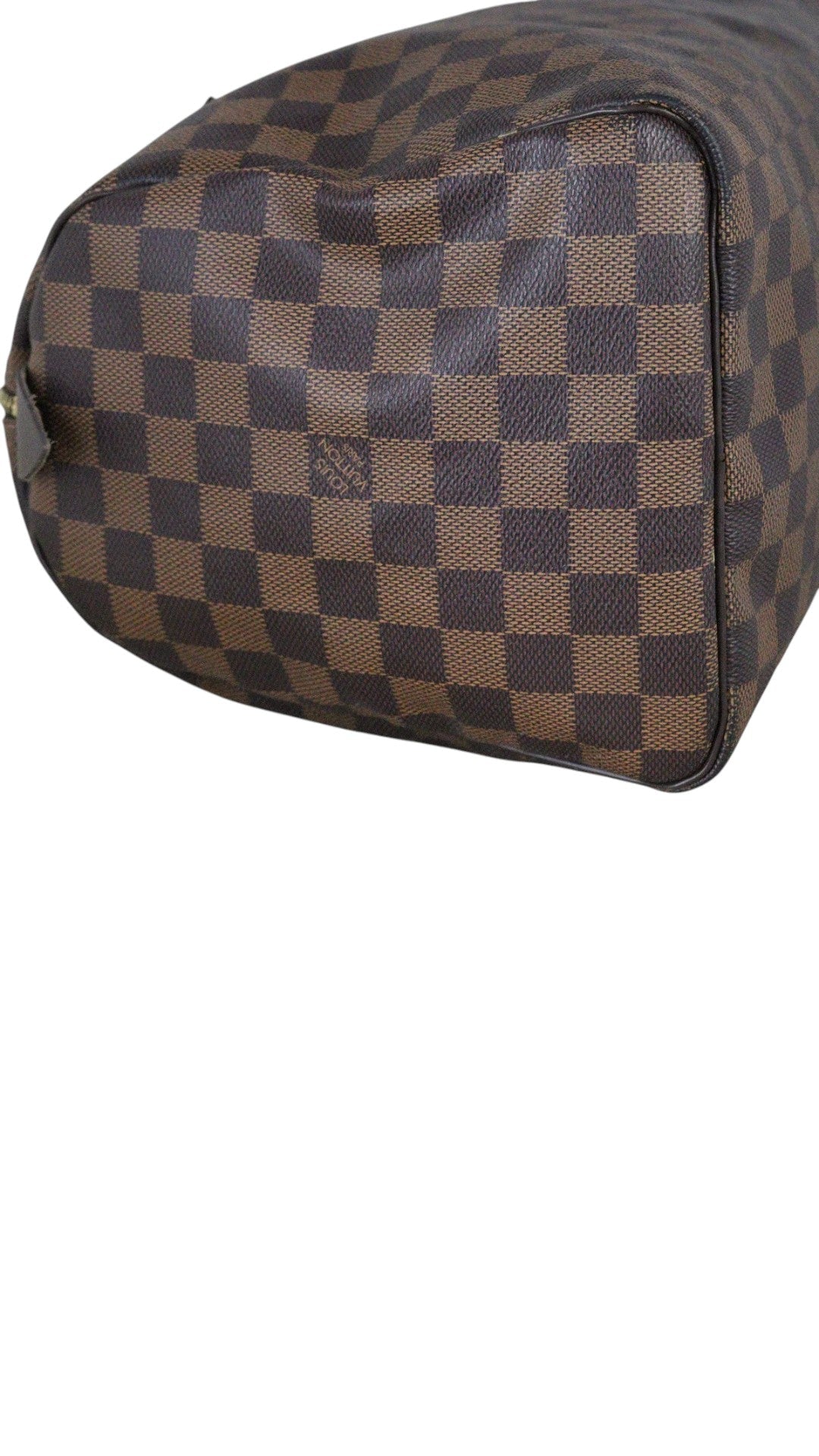 Sold Attire Louis Vuitton Speedy 30 Damier Ebene brown coated canvas handbag with leather trim and brass hardware.