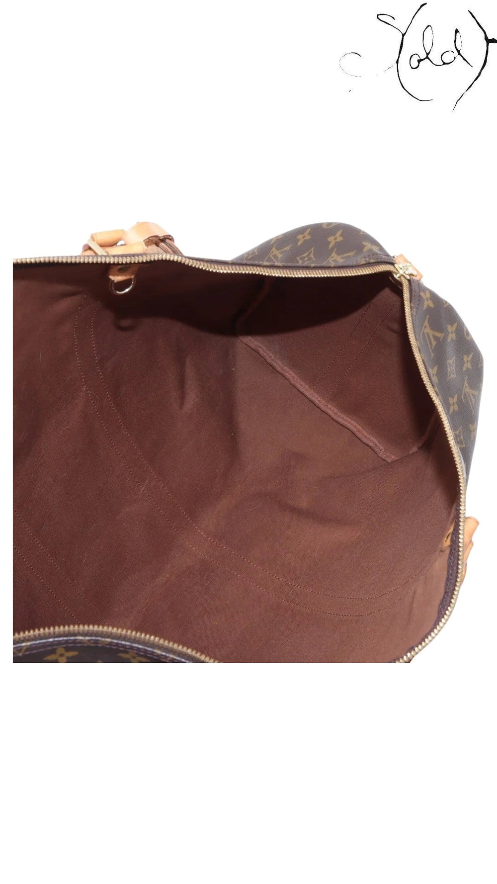 Sold Attire interior view of a vintage Louis Vuitton Keepall 55 travel bag with brown cotton textile lining