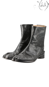 Sold Attire black leather Maison Margiela Tabi short boots with split-toe construction and low block heel.