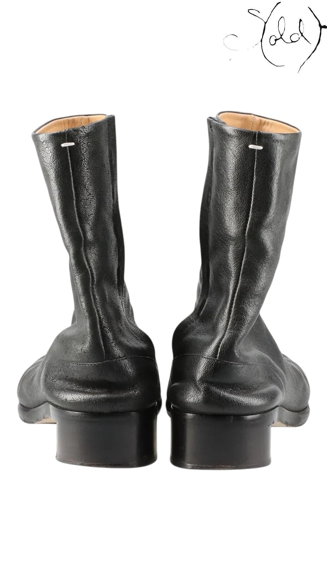Sold Attire black leather Maison Margiela Tabi short boots with split-toe construction and low block heel.
