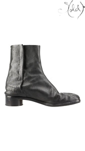 Sold Attire black leather Maison Margiela Tabi short boots with split-toe construction and low block heel.