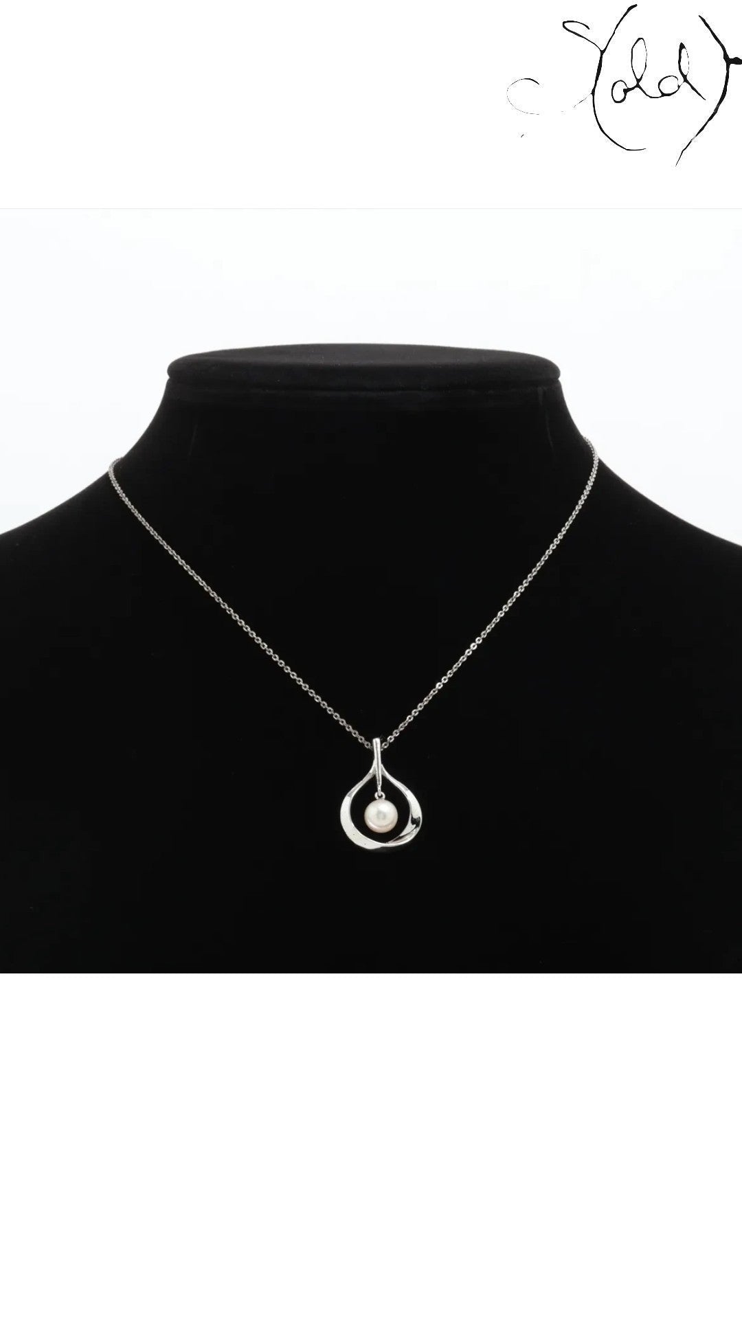 Sold Attire Mikimoto pearl pendant necklace featuring a cream cultured pearl set in a sterling silver teardrop frame.