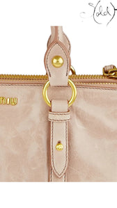 Sold Attire Miu Miu Vitello Lux Bow Bag in Fumo grey distressed leather with gold-tone hardware and tonal bow details.