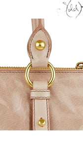 Sold Attire Miu Miu Vitello Lux Bow Bag in Fumo grey leather with gold-tone hardware and decorative bow detail.