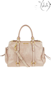 Sold Attire Miu Miu Vitello Lux Bow Bag in Fumo grey leather with gold-tone hardware and dual tonal bows.