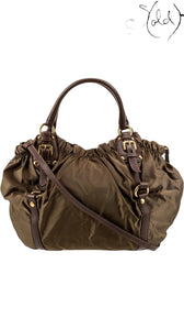 Sold Attire brown Prada Tessuto nylon tote bag with leather trim, gold-tone hardware, and shoulder strap.