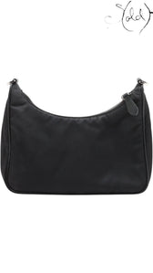 Sold Attire black Prada Re-Edition 2005 nylon shoulder bag with Saffiano leather trim and silver hardware.