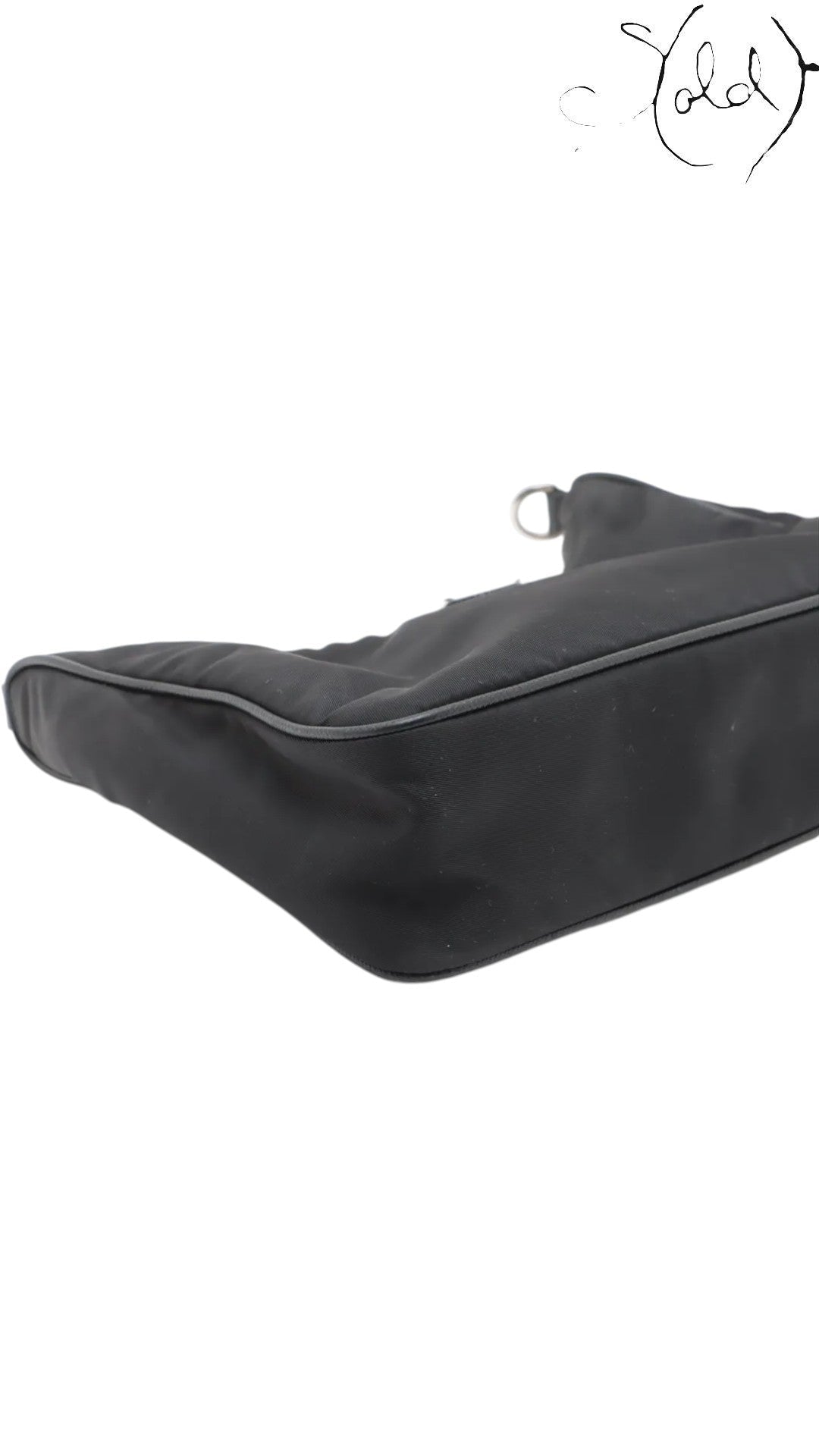 Sold Attire black Tessuto nylon Prada Re-Edition 2005 shoulder bag with Saffiano leather trim and silver hardware.