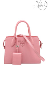 Sold Attire pink Prada Monochrome Tote Mini Saffiano leather bag with city calf trim and gold hardware.