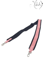 Sold Attire navy blue and pink striped adjustable shoulder strap with pink leather accents and silver hardware.