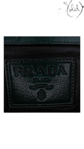 Sold Attire black Glace calf leather weekender bag with silver hardware and Prada logo detail.