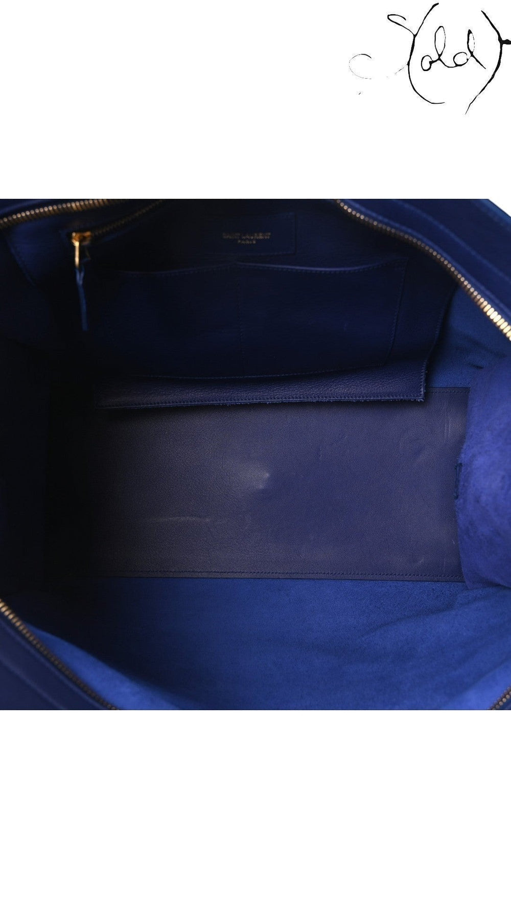 Interior of a royal blue Saint Laurent Medium Classic Y Cabas tote bag featuring suede lining and Sold Attire branding.
