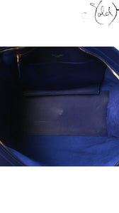 Interior of a royal blue Saint Laurent Medium Classic Y Cabas tote bag featuring suede lining and Sold Attire branding.