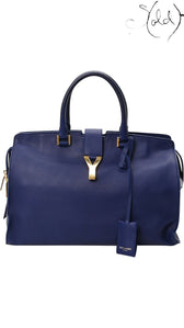 Sold Attire Saint Laurent Medium Classic Y Cabas tote in royal blue calfskin with polished gold-tone Y charm.