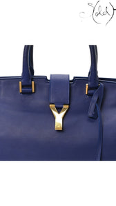 Sold Attire Saint Laurent Medium Classic Y Cabas in royal blue calfskin leather with a polished gold-tone Y charm.