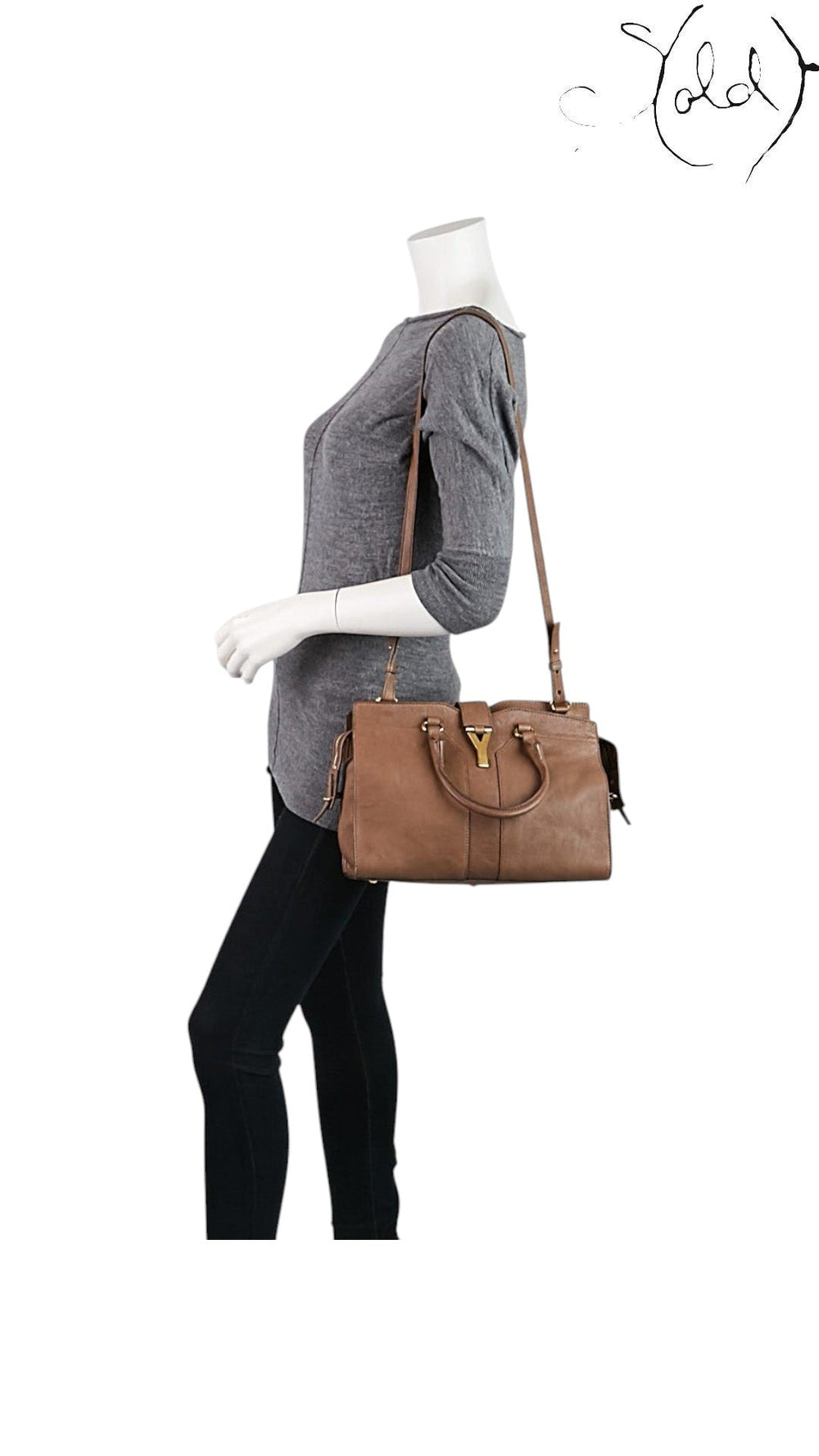Sold Attire mannequin wearing a brown sheepskin Saint Laurent Small Cabas Chyc bag with gold YSL hardware