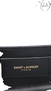 Sold Attire black leather Saint Laurent Kate Tassel crossbody bag with gold hardware and tassel detail.