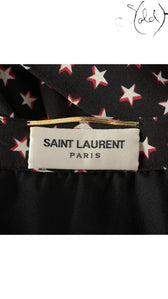 Sold Attire black Saint Laurent silk twill skirt with white and red star print, size FR 38.