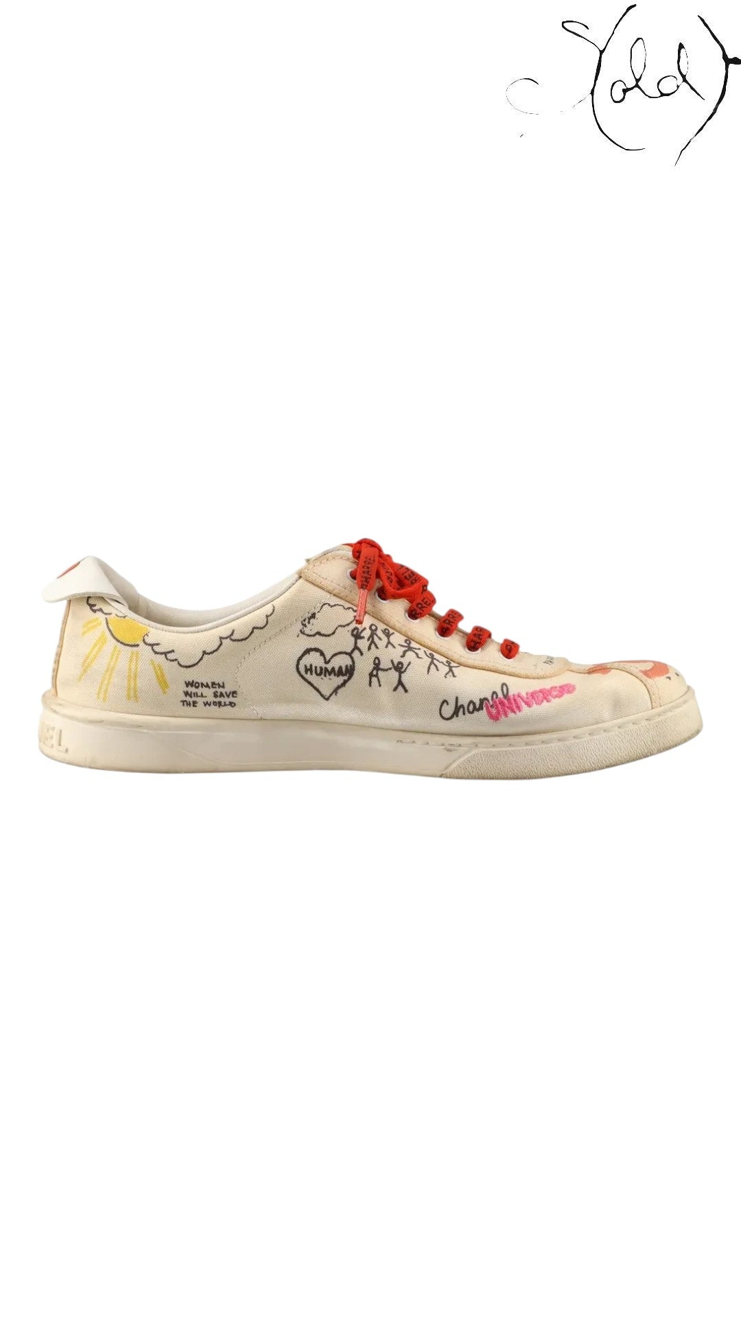 Sold Attire Chanel x Pharrell low-top sneakers in white canvas with multicolor graphic prints and red laces.