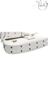 Sold Attire vintage Dior Street Chic shoulder bag in white leather with silver-tone hardware and eyelet detailing.
