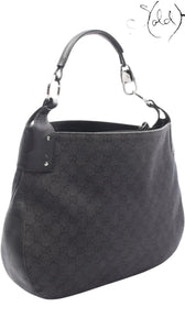 Sold Attire vintage Gucci 00s black GG Supreme canvas shoulder bag with calfskin leather trim and silver hardware