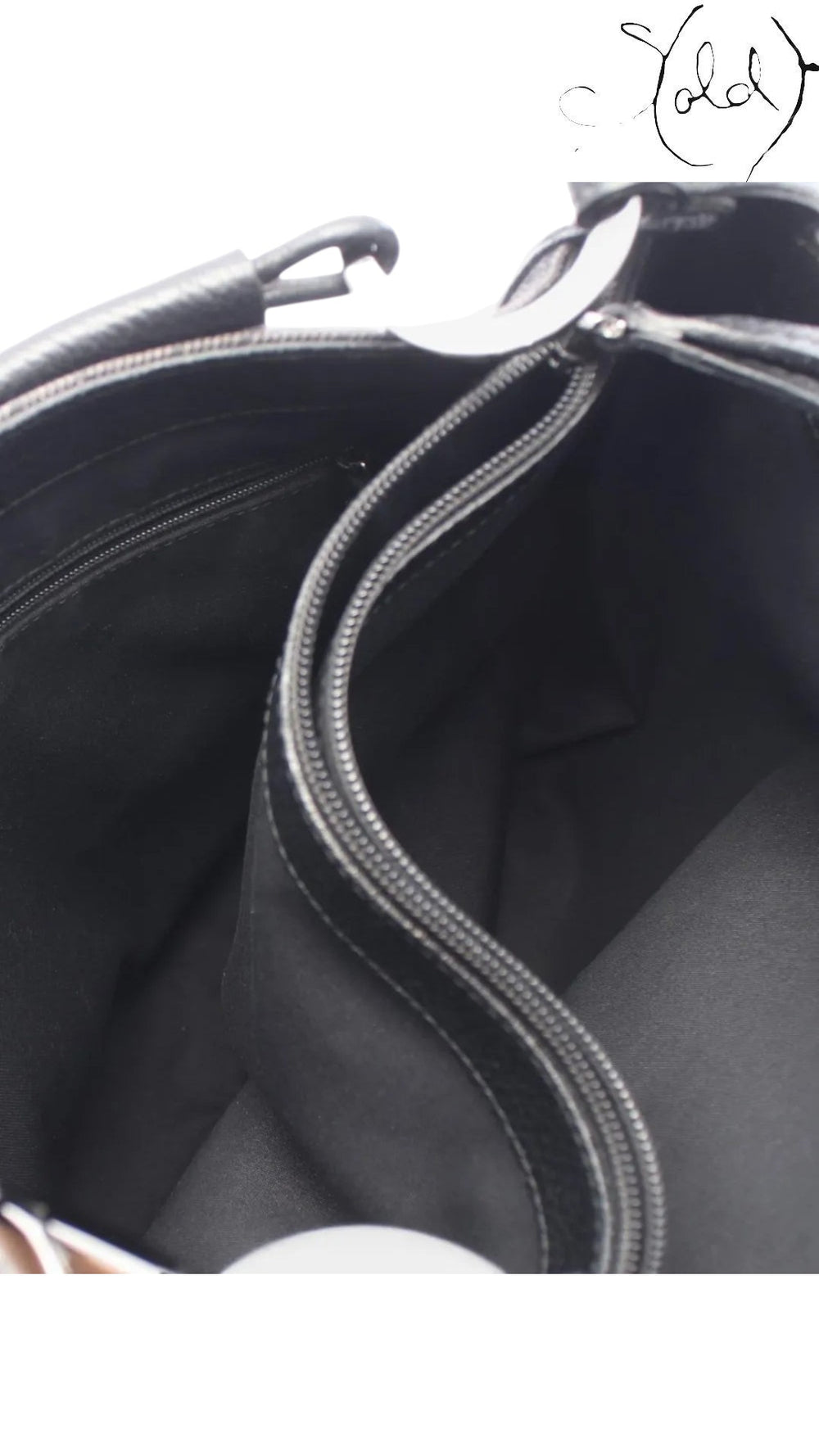 Sold Attire interior view of a black Gucci 00s GG Supreme shoulder bag showing the textile lining and zip pocket.
