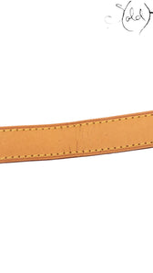 Sold Attire Louis Vuitton Keepall Bandoulière 55 natural cowhide leather shoulder strap with visible signs of wear