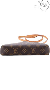 Sold Attire Louis Vuitton Pallas Clutch in brown Monogram coated canvas with a vachetta leather shoulder strap