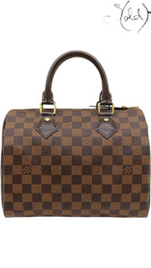 Sold Attire Louis Vuitton Speedy 25 in brown Damier Ebene coated canvas with leather trim and brass-tone hardware.